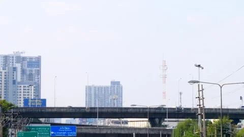 Car Driving On The Road Between The Sky By Expressway On Bridge Stock Footage 262140934
