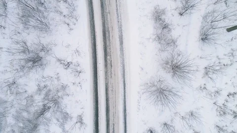 Car driving on the road in the winter forest Stock-Footage 84886899