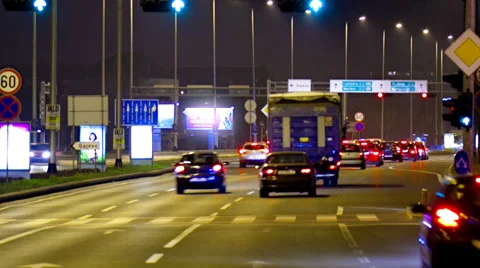 Car driving Rush-hour Traffic in city time lapse night Stockbeeldmateriaal 36254261