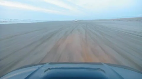 Car Driving on Sandy Beach Point of View Stock Footage 10829229