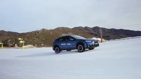 Car Driving on snow rolling shoot 2 Stock Footage 236422982