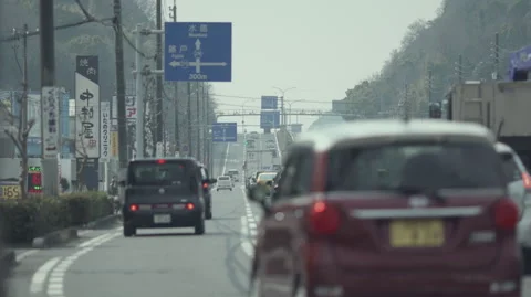 Car driving in the suburbs Stock Footage 246682746