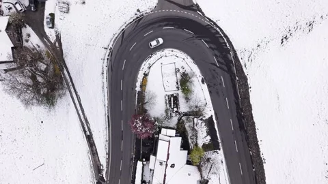 Car Driving Through 180 Degree Hairpin Mountain Curve Stock Footage 331587497