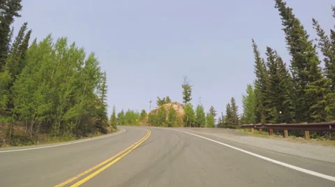 Car driving through alpine forest on Mount Evans-POV point of view. Stock Footage 64518006