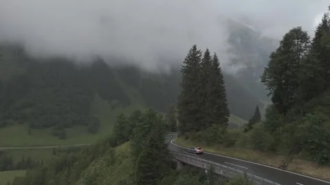Car Driving Through Alpine Road - Aerial View Stock Footage 280307198