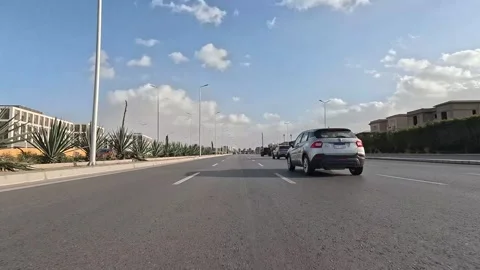 Car Driving Through Bright Streets New Cairo Showing Buildings Traffic Vehicles Stock Footage 329656661