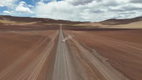 Car driving through desert Stock Footage 327453316