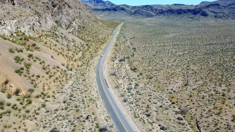 Car driving through desert mountain view outside Las Vegas, Nevada, USA in 4K Stock Footage