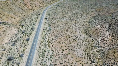 Car driving through desert mountain view outside Las Vegas, Nevada, USA in 4K Stockbeeldmateriaal 90361925