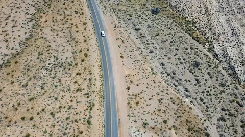 Car driving through desert outside Las Vegas, Nevada, USA in 4K Stockbeeldmateriaal 90361929