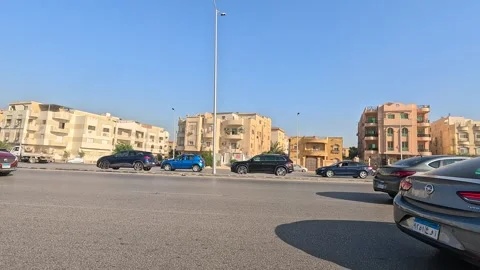 Car Driving Through Developed District Streets New Cairo Showing Buildings Stock Footage 329817675