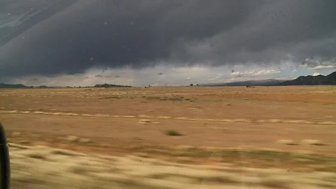 A car driving through a field Stock Footage 108872823
