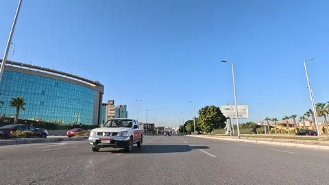 Car Driving Through Growing Modern Roads New Cairo Showing Buildings Traffic 動画素材 329672896