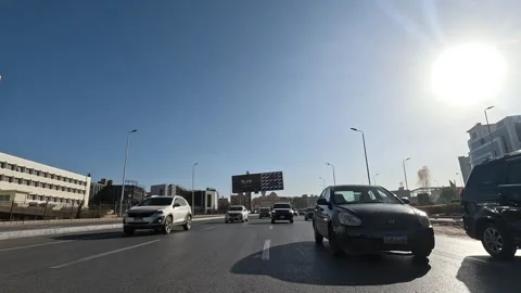 Car Driving Through Large Roads New Cairo Showing Buildings Traffic And Urban Stock Footage 329673772
