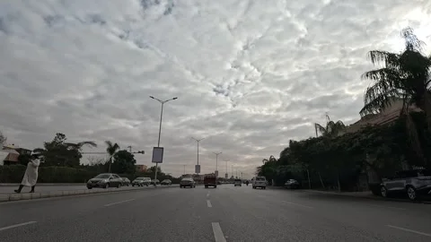 Car Driving Through Large Roads New Cairo Showing Buildings Traffic And Urban Stock Footage 329780195