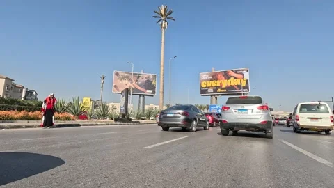 Car Driving Through Modern Planned Residential Roads New Cairo Showing Buildings Stock Footage 329803750