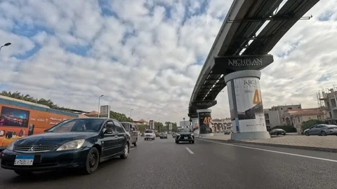 Car Driving Through Newly Developed City Streets New Cairo Showing Buildings Stock Footage 329703262