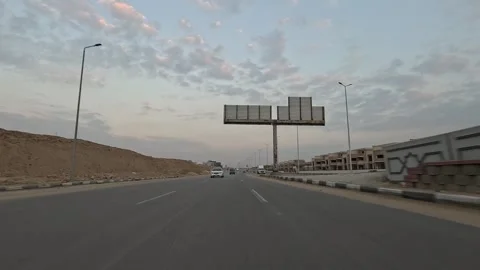 Car Driving Through Newly Developed City Streets New Cairo Showing Buildings Stock Footage 329897336
