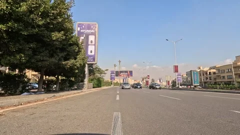 Car Driving Through Organized District Roads New Cairo Showing Buildings Traffic Stock Footage 329868023