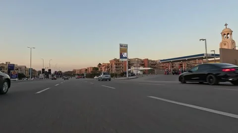 Car Driving Through Quiet Urban District Streets New Cairo Showing Buildings Stock Footage 329787229