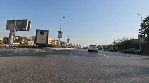 Car Driving Through Quiet Urban District Streets New Cairo Showing Buildings Stock Footage 329800501