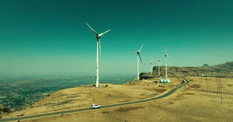 Car Driving Through Scenic Windmill Landscape Stock Footage 304105853