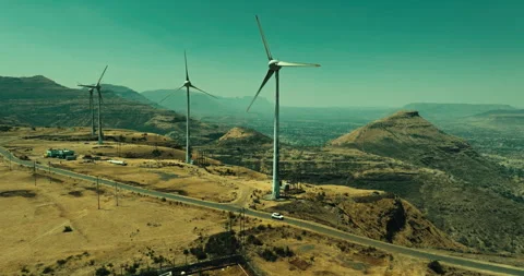 Car Driving Through Scenic Windmill Landscape Stock Footage 304106191