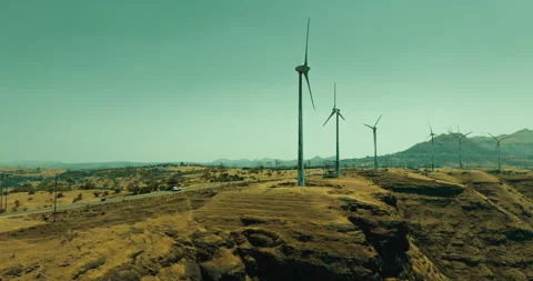 Car Driving Through Scenic Windmill Landscape Stockbeeldmateriaal 304106211