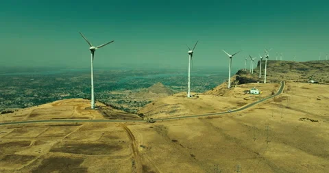 Car Driving Through Scenic Windmill Landscape Stockbeeldmateriaal 304106271