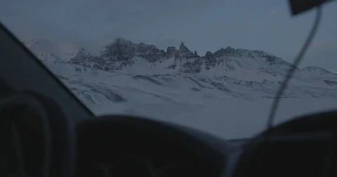 Car driving through the snow covered landscape Video stock 103809209