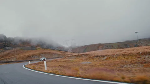 Car driving through the stelvio pass Stock Footage 169589734