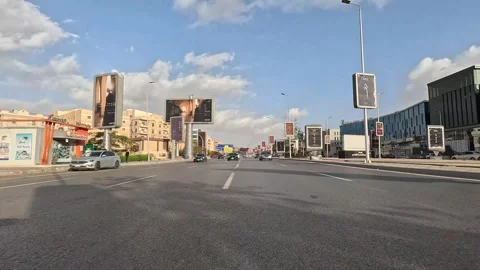 Car Driving Through Vibrant Modern Roads New Cairo Showing Buildings Traffic Vídeo Stock 329660662