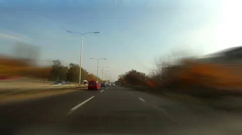 Car driving time laps thru cityscape Stockbeeldmateriaal 10563128