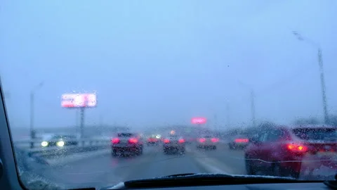 Car, driving in traffic jam, rain and wet glass, traveling Stock-Footage 295547745