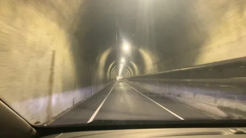 Car driving in tunnel Stock Footage 197001048