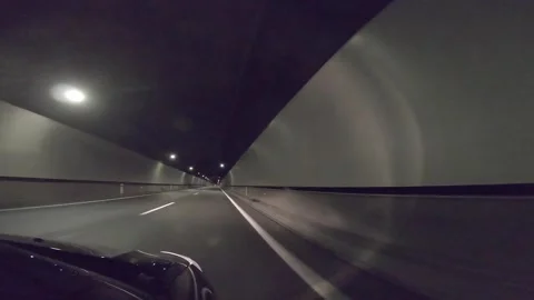 Car driving on a tunnel Stock Footage 240864953