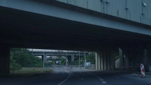 Car Driving Under Bridge on Road in Prague, Czech Republic, POV Perspective Stock Footage 346851765