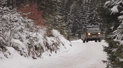 Car driving on a winding road, off-road in mountainous terrain Stock Footage 59159092