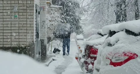 Car during heavy snowfall Stock Footage 146482602