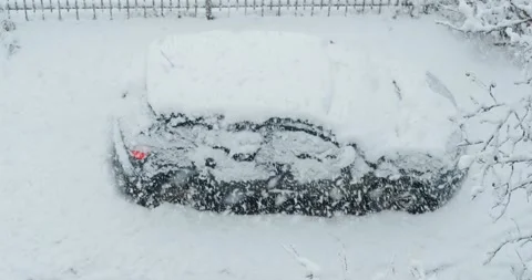 Car during heavy snowfall Stock Footage 146484279