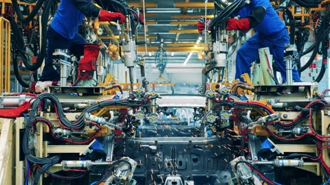 Car elements are getting spot welded during manufacturing Stock Footage 142786102