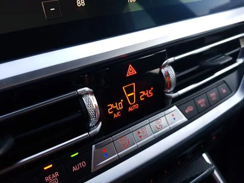 Car elements. Temperature control device on car center console 库存照片