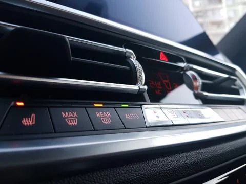 Car elements. Temperature control device on car center console Stock Photos
