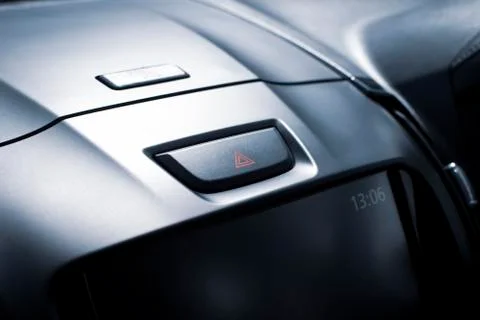 Car emergency light button on car console. Stock Photos