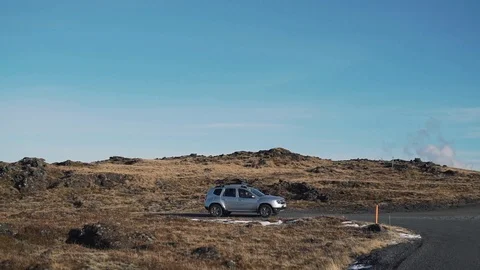 Car on an empty Iceland road Stock Footage 89803215