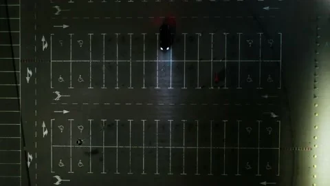 The car on the empty parking at night, aerial shot. Stock Footage 147463592