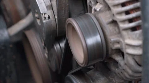 Car engine alternator pulley and belt rotating Stock Footage 327401848