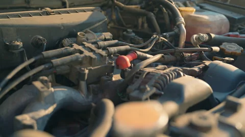 Car Engine Bay Close Up. Parallax Camera Movement Around Red Alternator Terminal 스톡 동영상 339749331