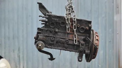 Car engine block hanging with chain during repair 스톡 사진