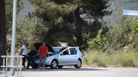 Car Engine Broken Down Hood up Folk Check Stock Footage 50995593